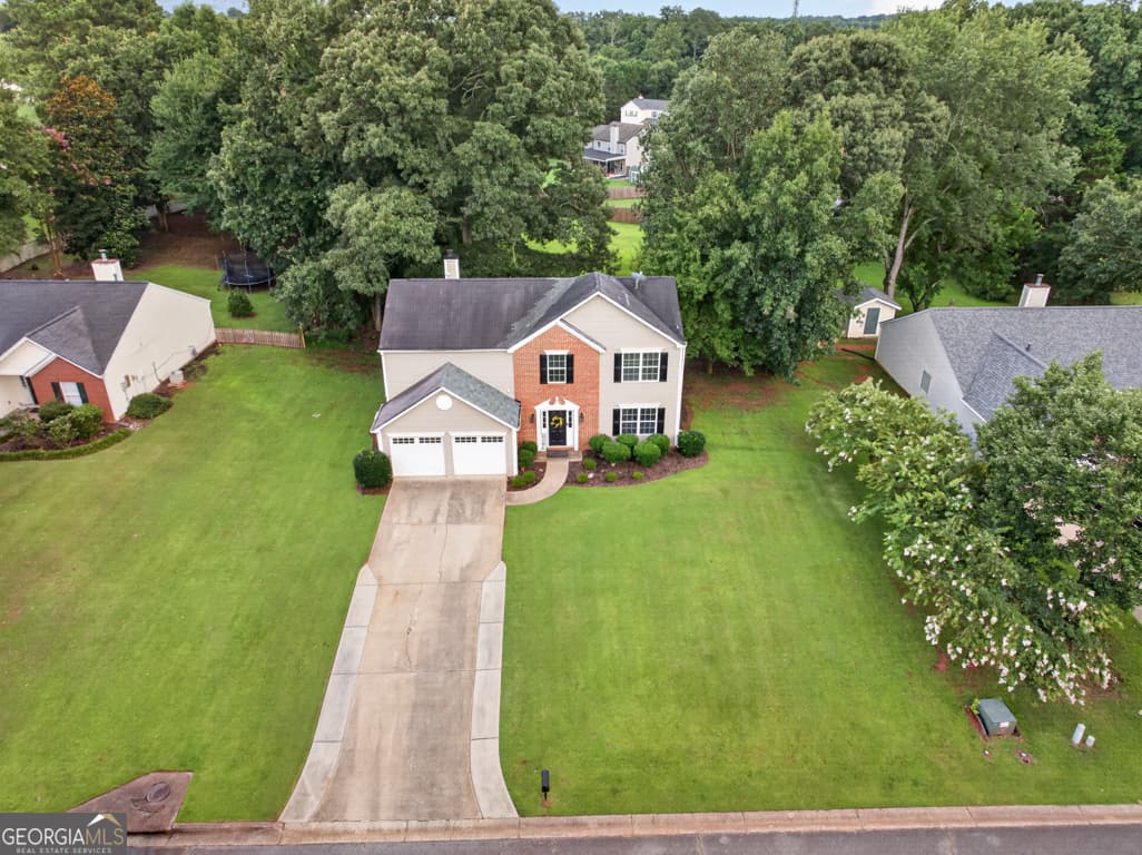 4 bedroom, 2.5 bathroom, 2,152 sq ft single family residence for sale at 4110 Ridgebrook Bend, Cumming, GA 30028 — photo 3