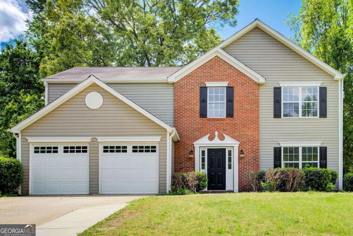 4 bedroom, 2.5 bathroom, 2,152 sq ft single family residence for sale at 4110 Ridgebrook Bend, Cumming, GA 30028 — photo 1 of 56