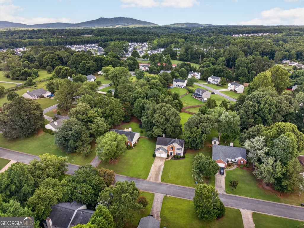 4 bedroom, 2.5 bathroom, 2,152 sq ft single family residence for sale at 4110 Ridgebrook Bend, Cumming, GA 30028 — photo 5