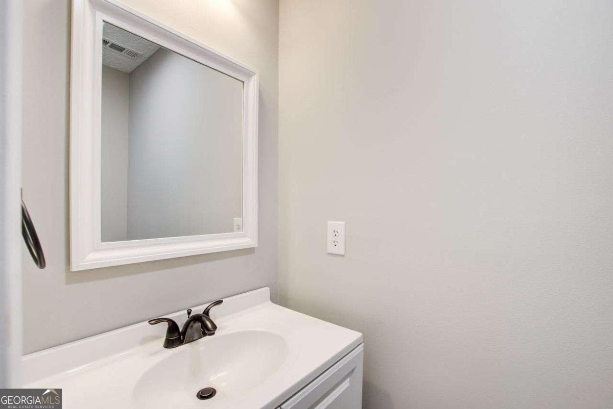 4 bedroom, 2.5 bathroom, 2,152 sq ft single family residence for sale at 4110 Ridgebrook Bend, Cumming, GA 30028 — photo 9