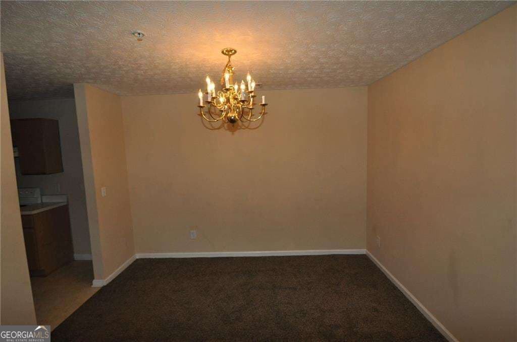 3 bedroom, 2 bathroom, 1,202 sq ft condominium for sale at 8304 Par Four Way, Lithonia, GA 30038 — photo 2