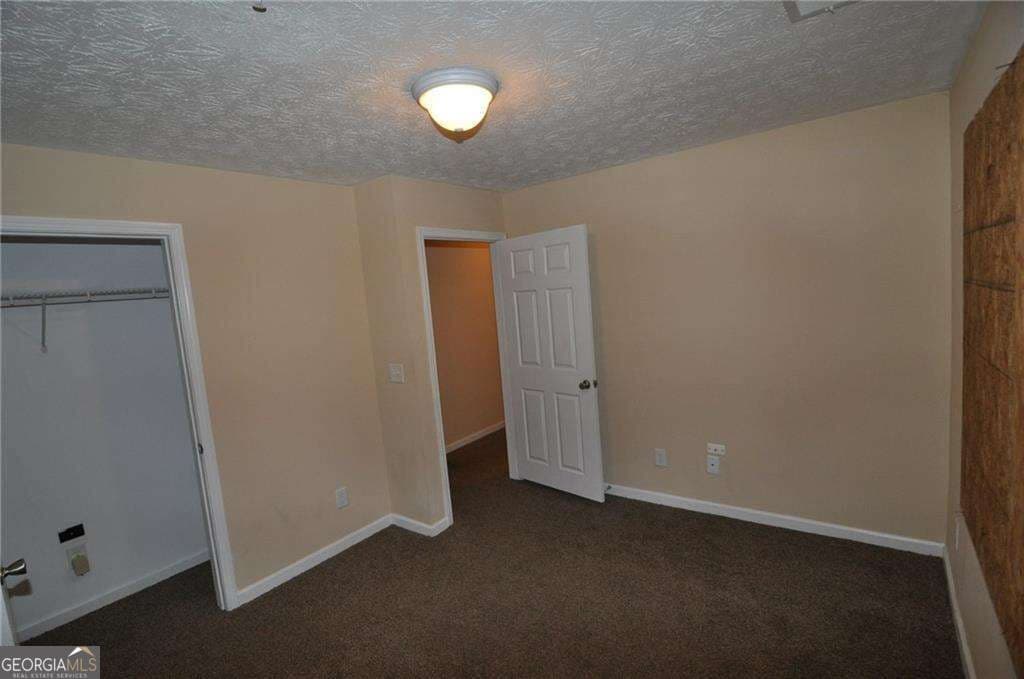 3 bedroom, 2 bathroom, 1,202 sq ft condominium for sale at 8304 Par Four Way, Lithonia, GA 30038 — photo 7