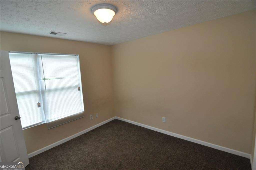 3 bedroom, 2 bathroom, 1,202 sq ft condominium for sale at 8304 Par Four Way, Lithonia, GA 30038 — photo 5