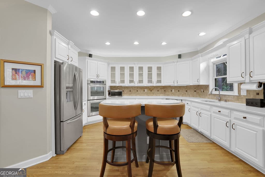 6 bedroom, 5 bathroom, 5,588 sq ft single family residence for sale at 4294 Balmoral Glen Drive, Norcross, GA 30092 — photo 4