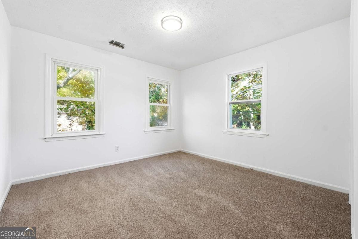 3 bedroom, 2.5 bathroom, 2,016 sq ft single family residence for sale at 6917 Laurelwood Drive, Douglasville, GA 30135 — photo 7