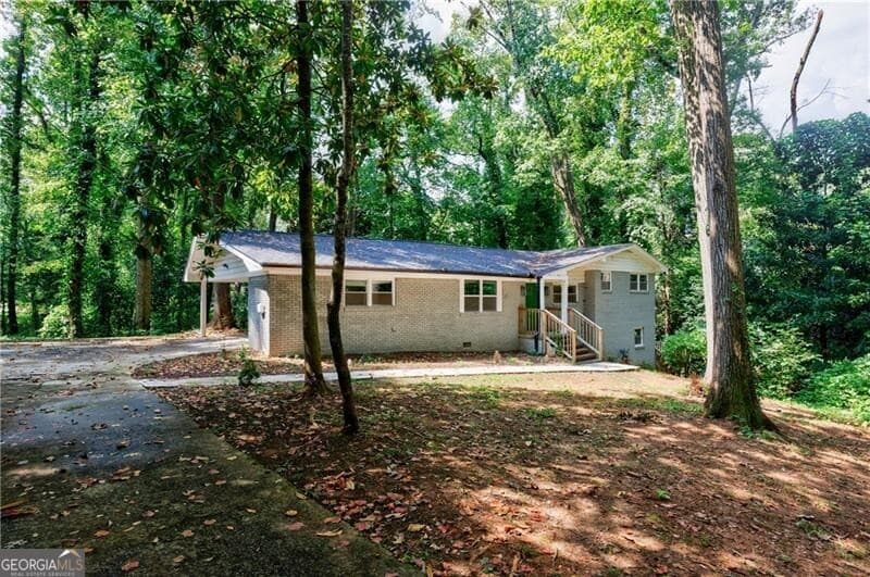 4 bedroom, 2 bathroom, 2,214 sq ft single family residence for sale at 4305 Christine Court, Decatur, GA 30035 — photo 1 of 45