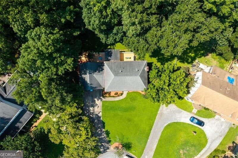 4 bedroom, 2.5 bathroom single family residence for sale at 5497 Georgetown Trace, Lilburn, GA 30047 — photo 2