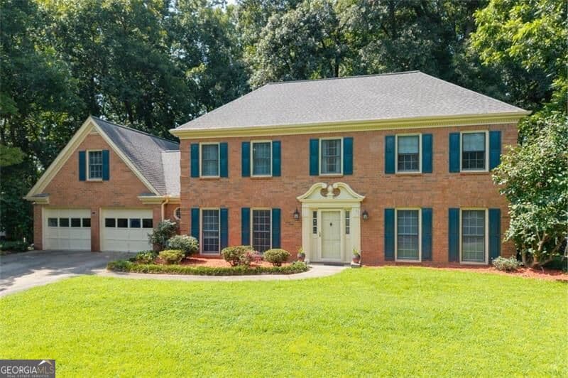 4 bedroom, 2.5 bathroom single family residence for sale at 5497 Georgetown Trace, Lilburn, GA 30047 — photo 3