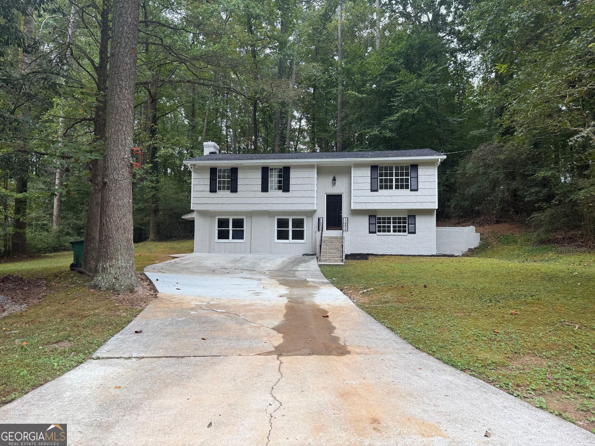 5 bedroom, 2.5 bathroom, 2,452 sq ft single family residence for sale at 5959 Simone Drive, Stone Mountain, GA 30087