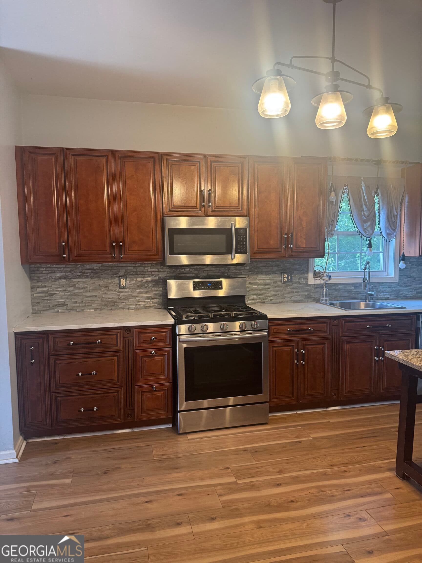 5 bedroom, 4.5 bathroom, 3,762 sq ft single family residence for sale at 330 Oak Park Square, College Park, GA 30349 — photo 2