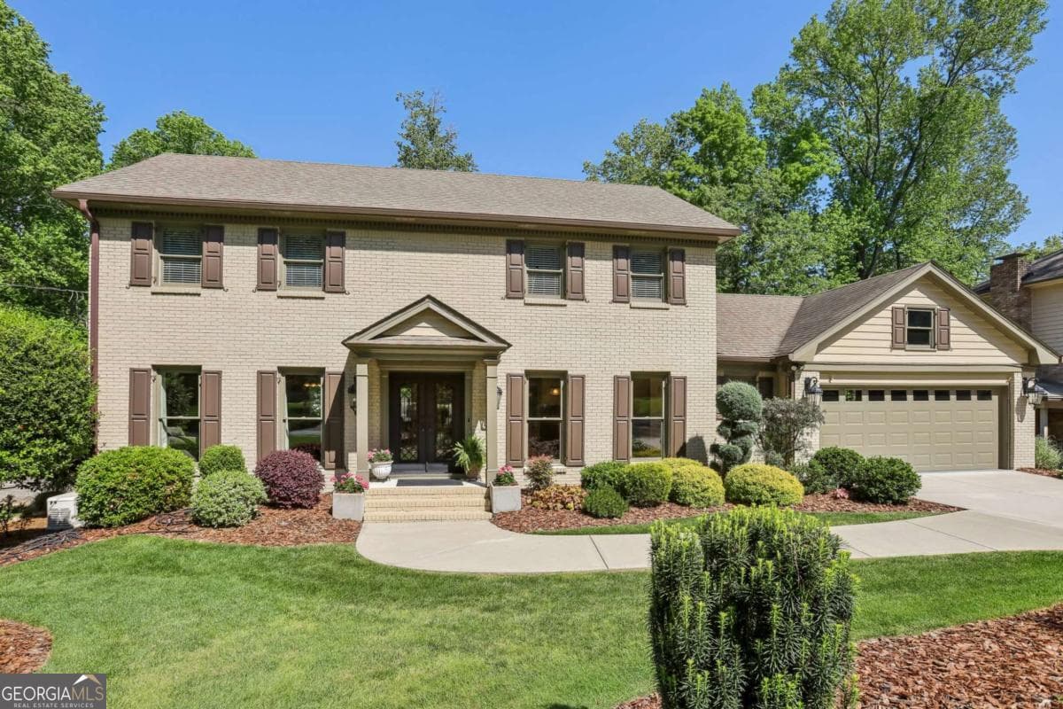 5 bedroom, 3.5 bathroom, 3,816 sq ft single family residence sold at 1922 Olde Village Run, Dunwoody, GA 30338