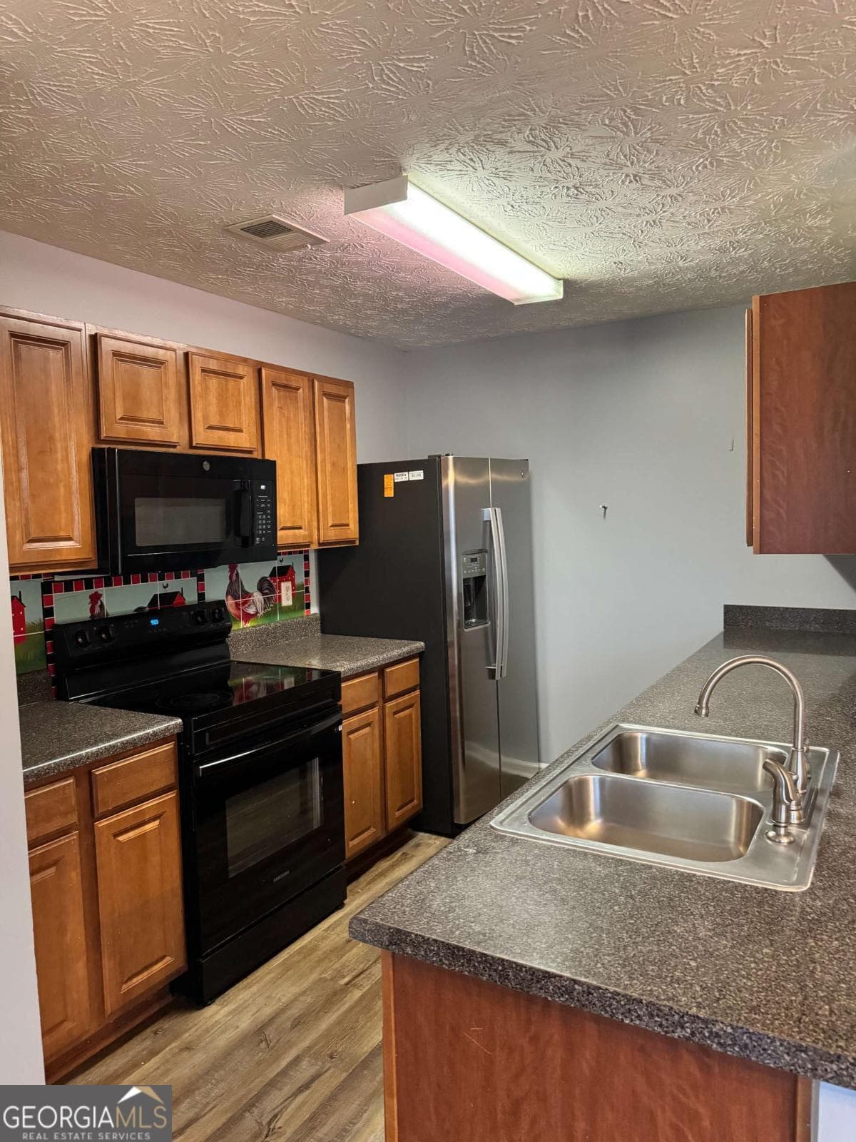 2 bedroom, 2.5 bathroom, 1,414 sq ft townhouse for sale at 1754 Grove Way, Hampton, GA 30228 — photo 6