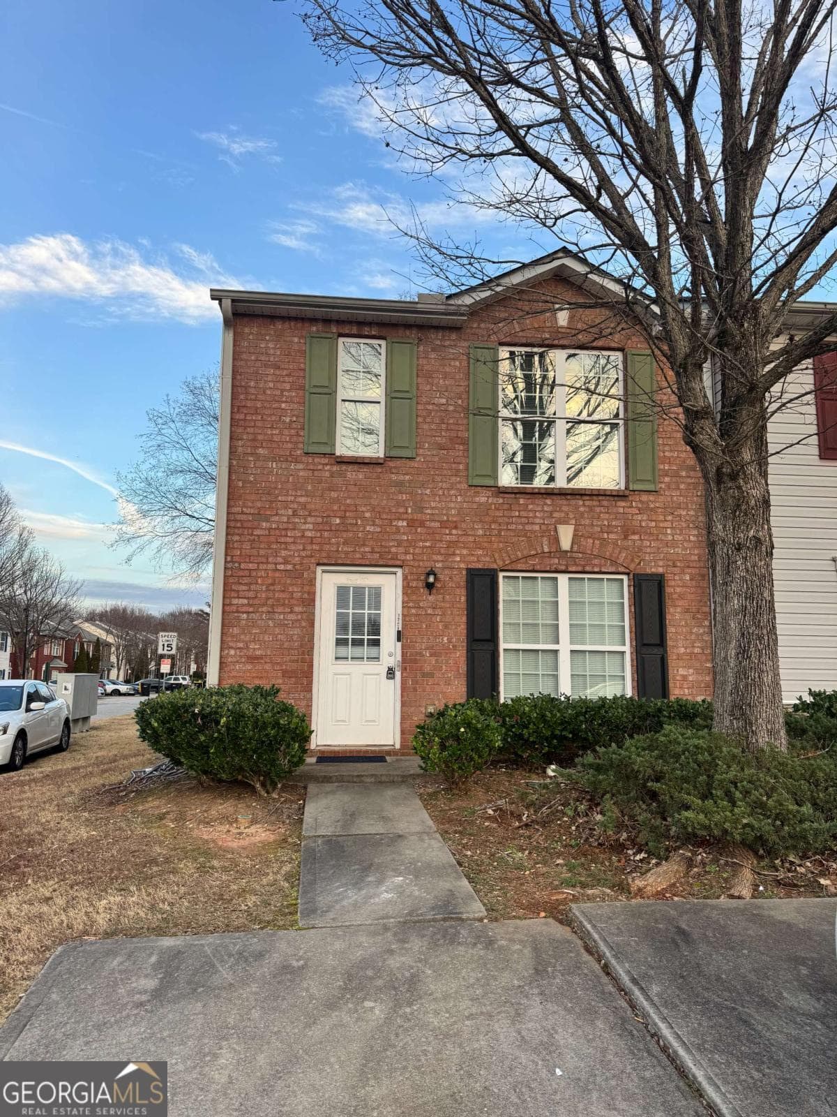2 bedroom, 2.5 bathroom, 1,414 sq ft townhouse for sale at 1754 Grove Way, Hampton, GA 30228 — photo 1 of 20