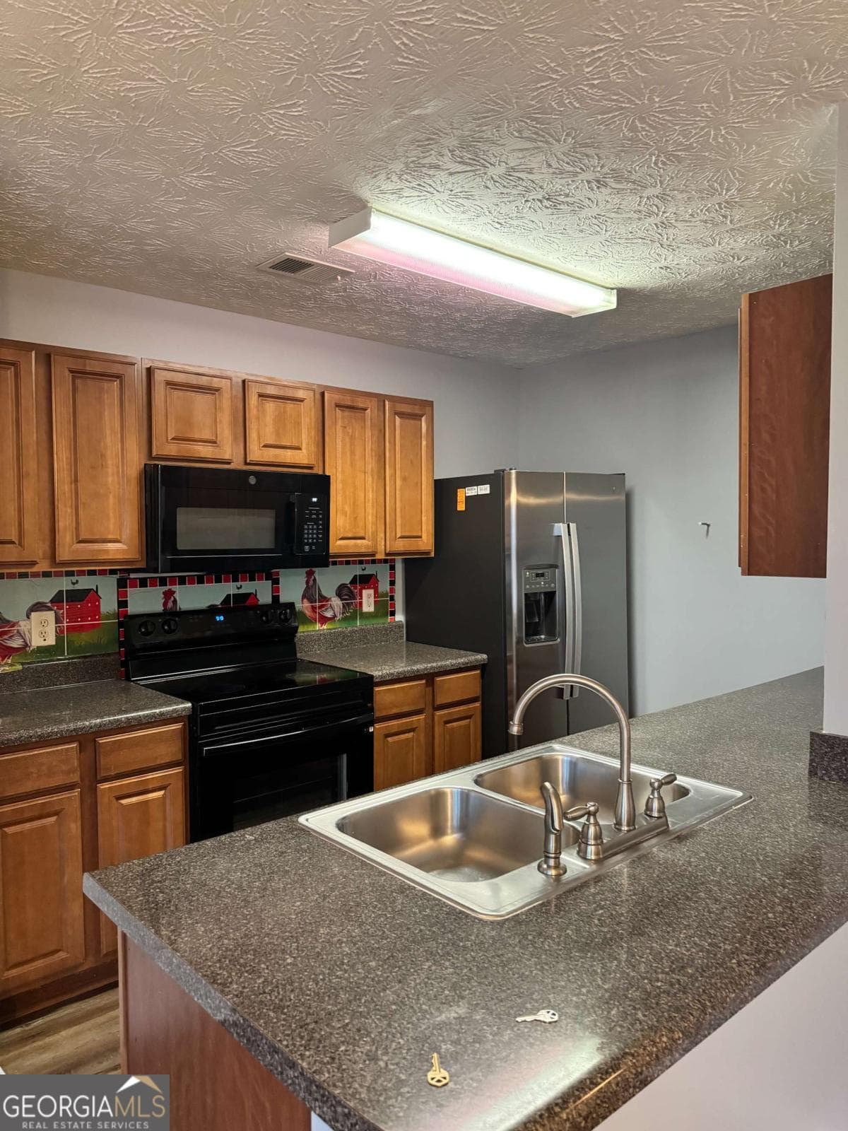 2 bedroom, 2.5 bathroom, 1,414 sq ft townhouse for sale at 1754 Grove Way, Hampton, GA 30228 — photo 9