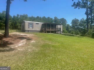 2 bedroom, 1 bathroom, 980 sq ft manufactured home,single family residence sold at 319 Winchester, Sylvania, GA 30467