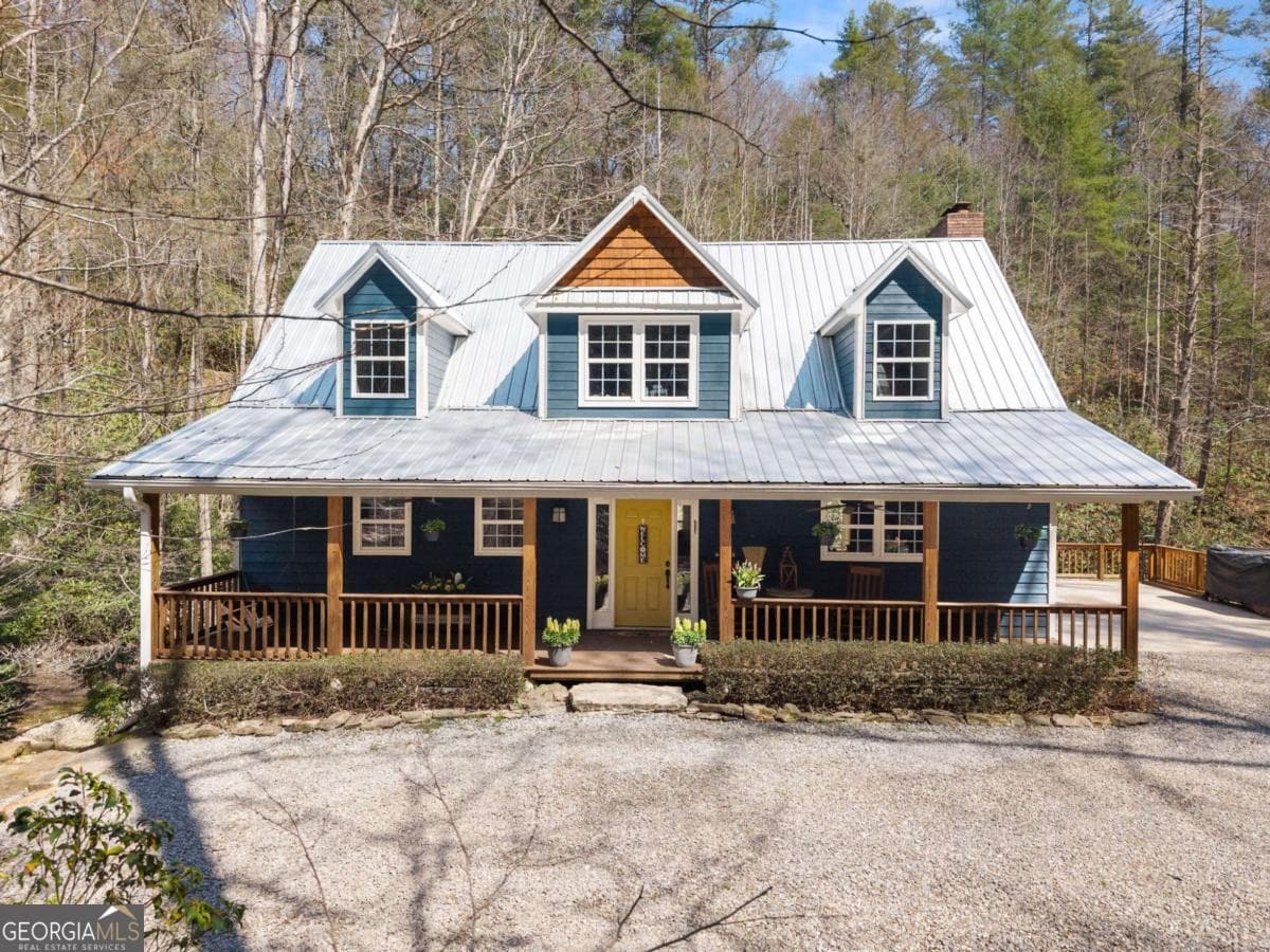 4 bedroom, 4.5 bathroom, 2,052 sq ft cabin,single family residence for sale at 7880 Hiawassee Wilderness Trail, Hiawassee, GA 30546 — photo 2