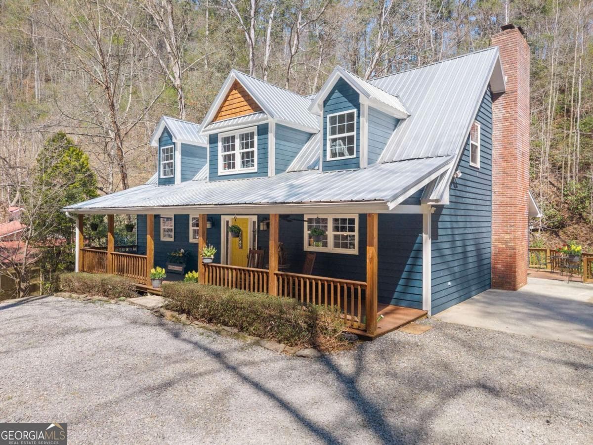 4 bedroom, 4.5 bathroom, 2,052 sq ft cabin,single family residence for sale at 7880 Hiawassee Wilderness Trail, Hiawassee, GA 30546 — photo 6