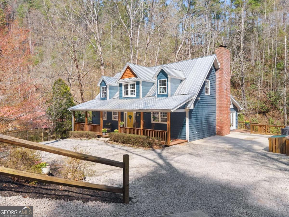 4 bedroom, 4.5 bathroom, 2,052 sq ft cabin,single family residence for sale at 7880 Hiawassee Wilderness Trail, Hiawassee, GA 30546 — photo 3