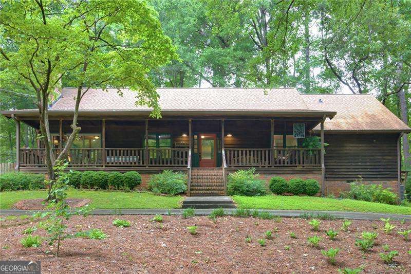 4 bedroom, 3 bathroom, 3,216 sq ft cabin,single family residence for sale at 496 Carlouetta Road, Mableton, GA 30126 — photo 2