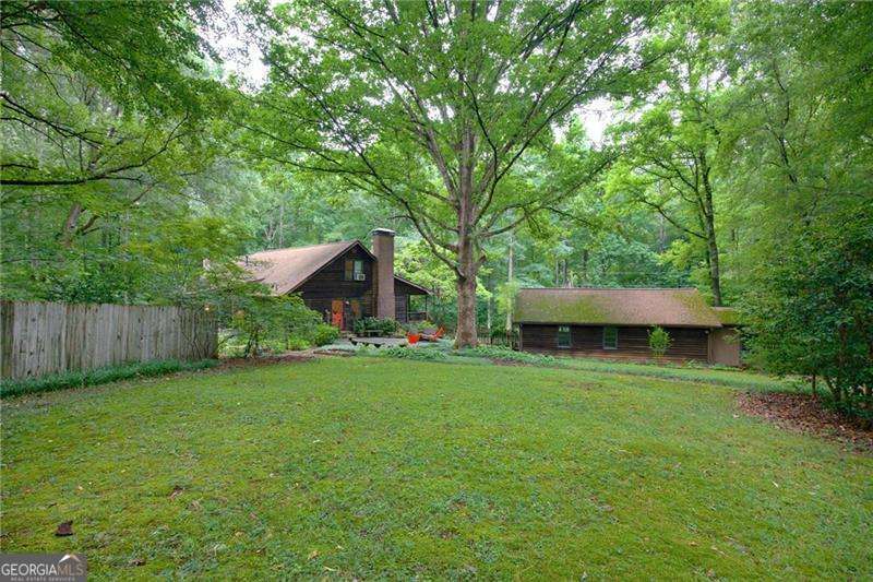 4 bedroom, 3 bathroom, 3,216 sq ft cabin,single family residence for sale at 496 Carlouetta Road, Mableton, GA 30126 — photo 9