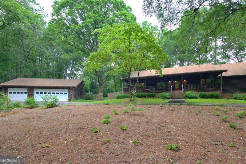 4 bedroom, 3 bathroom, 3,216 sq ft cabin,single family residence for sale at 496 Carlouetta Road, Mableton, GA 30126 — photo 4