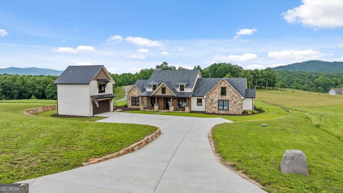 5 bedroom, 5.5 bathroom, 5,146 sq ft single family residence for sale at 84 Bravo Rivera Way, Ellijay, GA 30536 — photo 3