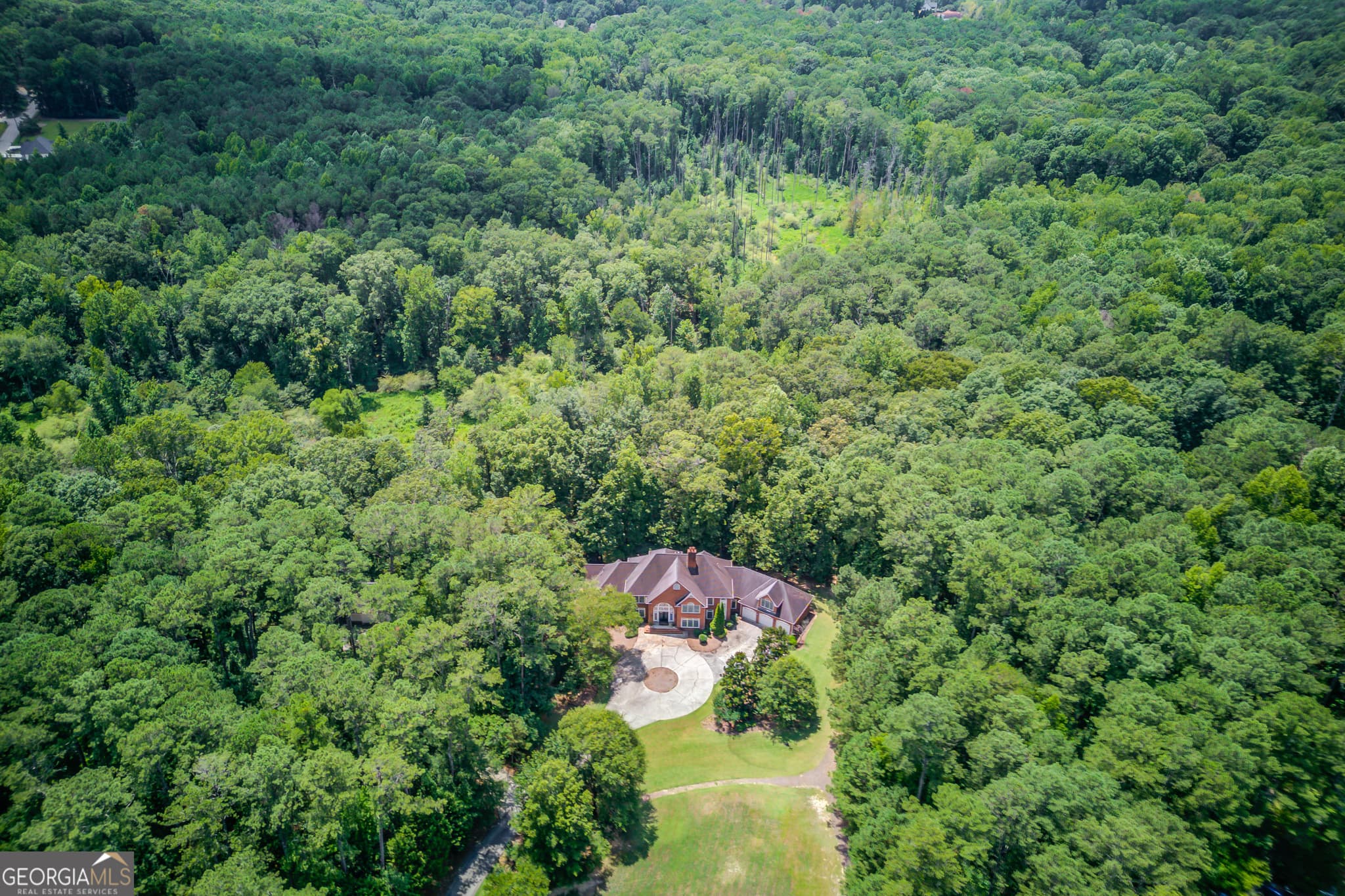 6 bedroom, 6.5 bathroom, 9,504 sq ft single family residence for sale at 1345 Chandler Road, Lawrenceville, GA 30045