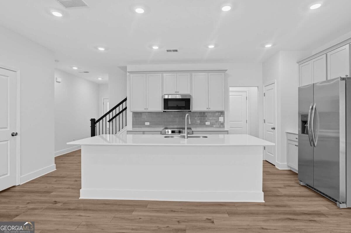3 bedroom, 2.5 bathroom, 1,846 sq ft townhouse for sale at 104 Rope Mill Court 2, Holly Springs, GA 30115 — photo 9