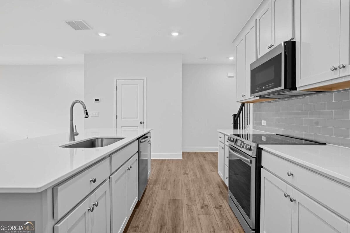 3 bedroom, 2.5 bathroom, 1,846 sq ft townhouse for sale at 104 Rope Mill Court 2, Holly Springs, GA 30115 — photo 10