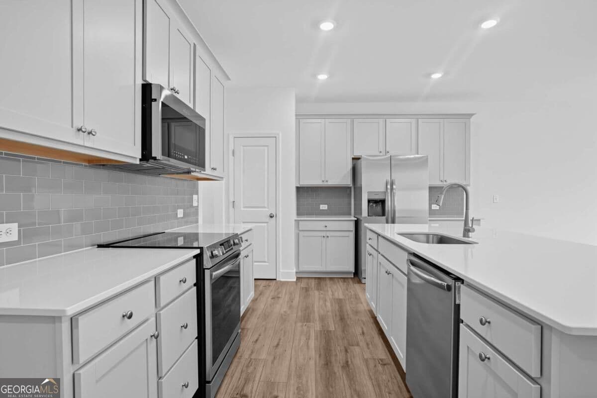 3 bedroom, 2.5 bathroom, 1,846 sq ft townhouse for sale at 104 Rope Mill Court 2, Holly Springs, GA 30115 — photo 8