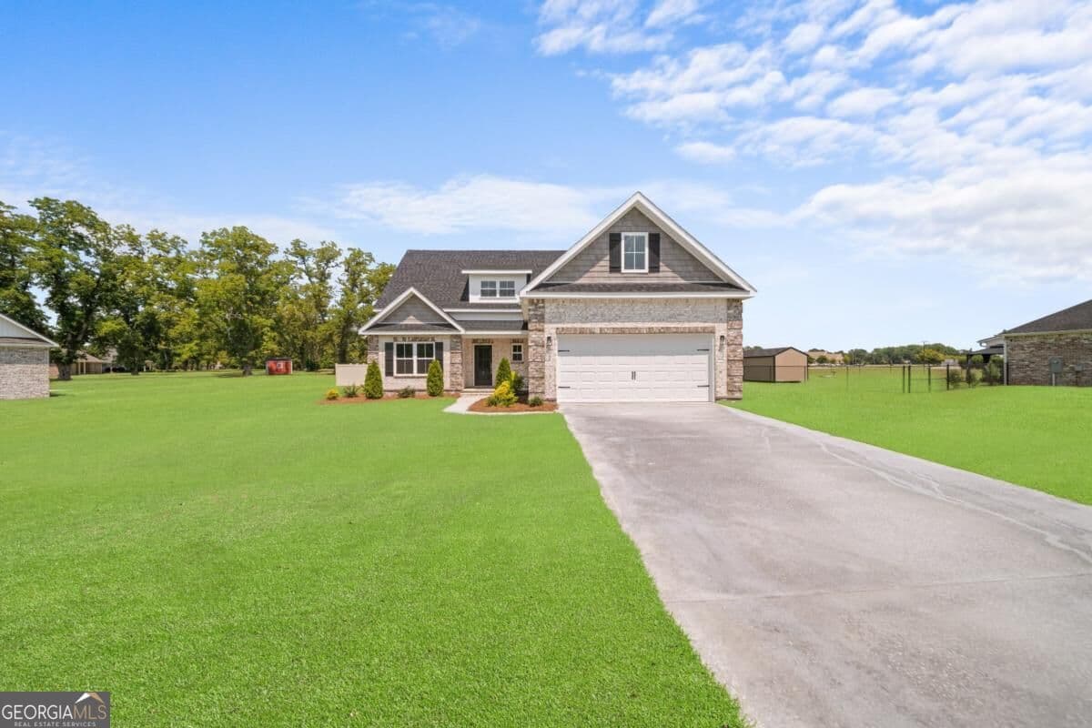 4 bedroom, 3 bathroom, 3,049 sq ft single family residence for sale at 7 Honeysuckle Drive, Claxton, GA 30417