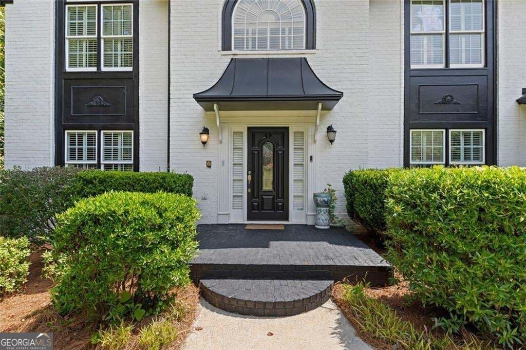 5 bedroom, 4 bathroom, 4,867 sq ft single family residence for sale at 5502 Oakwood Drive, Stone Mountain, GA 30087 — photo 2