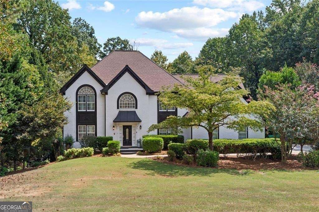 5 bedroom, 4 bathroom, 4,867 sq ft single family residence for sale at 5502 Oakwood Drive, Stone Mountain, GA 30087