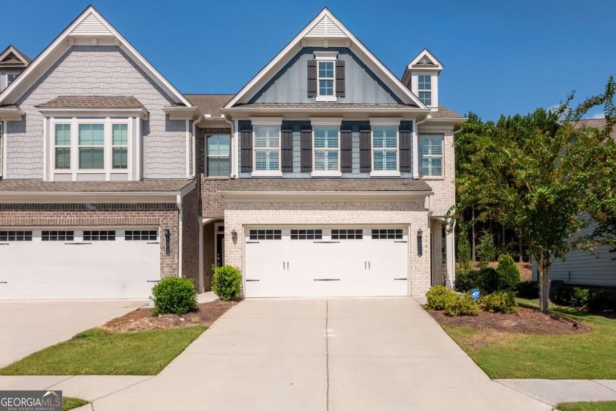 3 bedroom, 2.5 bathroom, 1,884 sq ft townhouse for sale at 6388 Lanier Harbor Landing, Buford, GA 30518 — photo 1 of 40