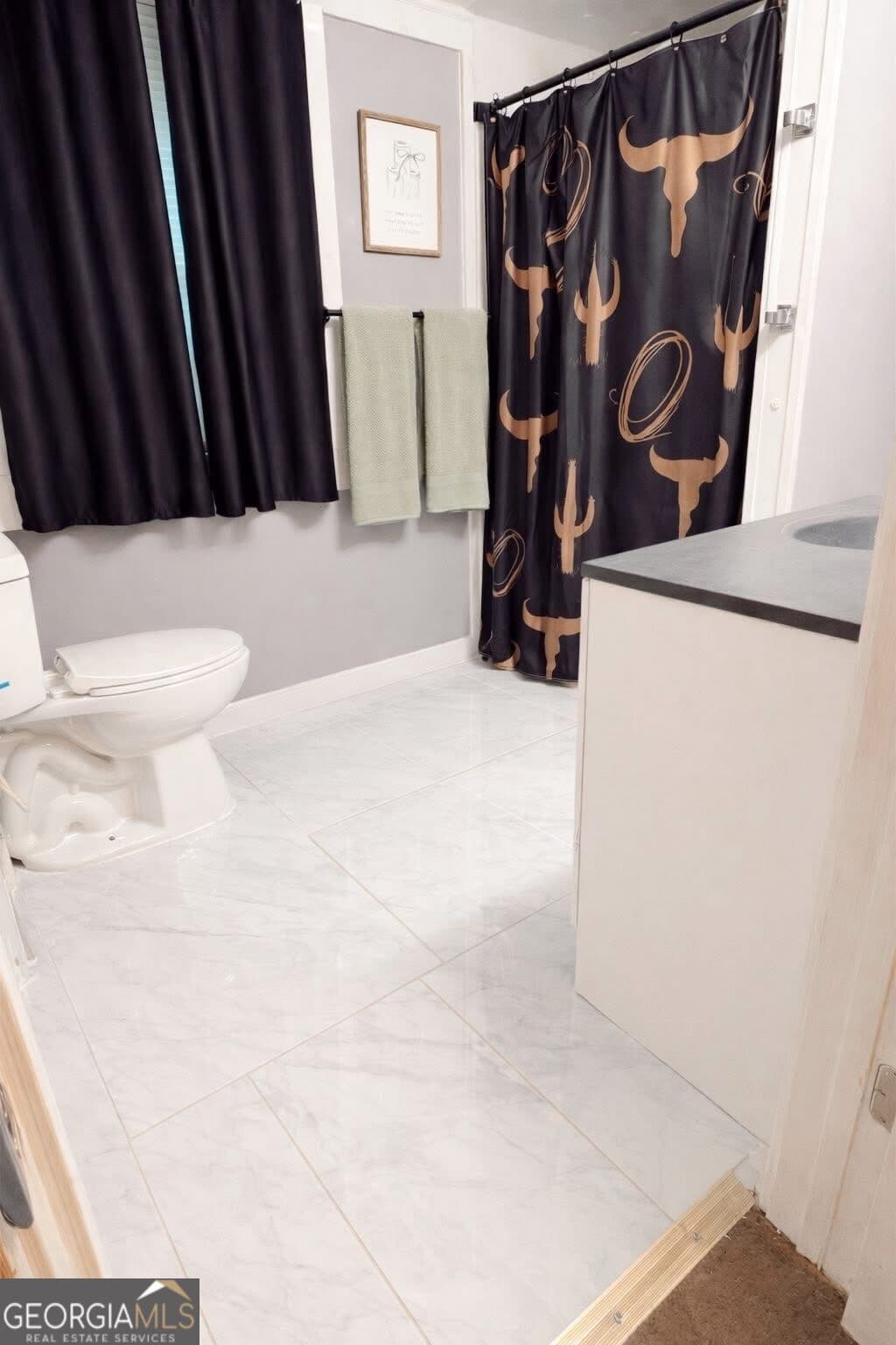 3 bedroom, 1 bathroom, 1,616 sq ft single family residence for sale at 6617 E College Street, Wrightsville, GA 31096 — photo 5