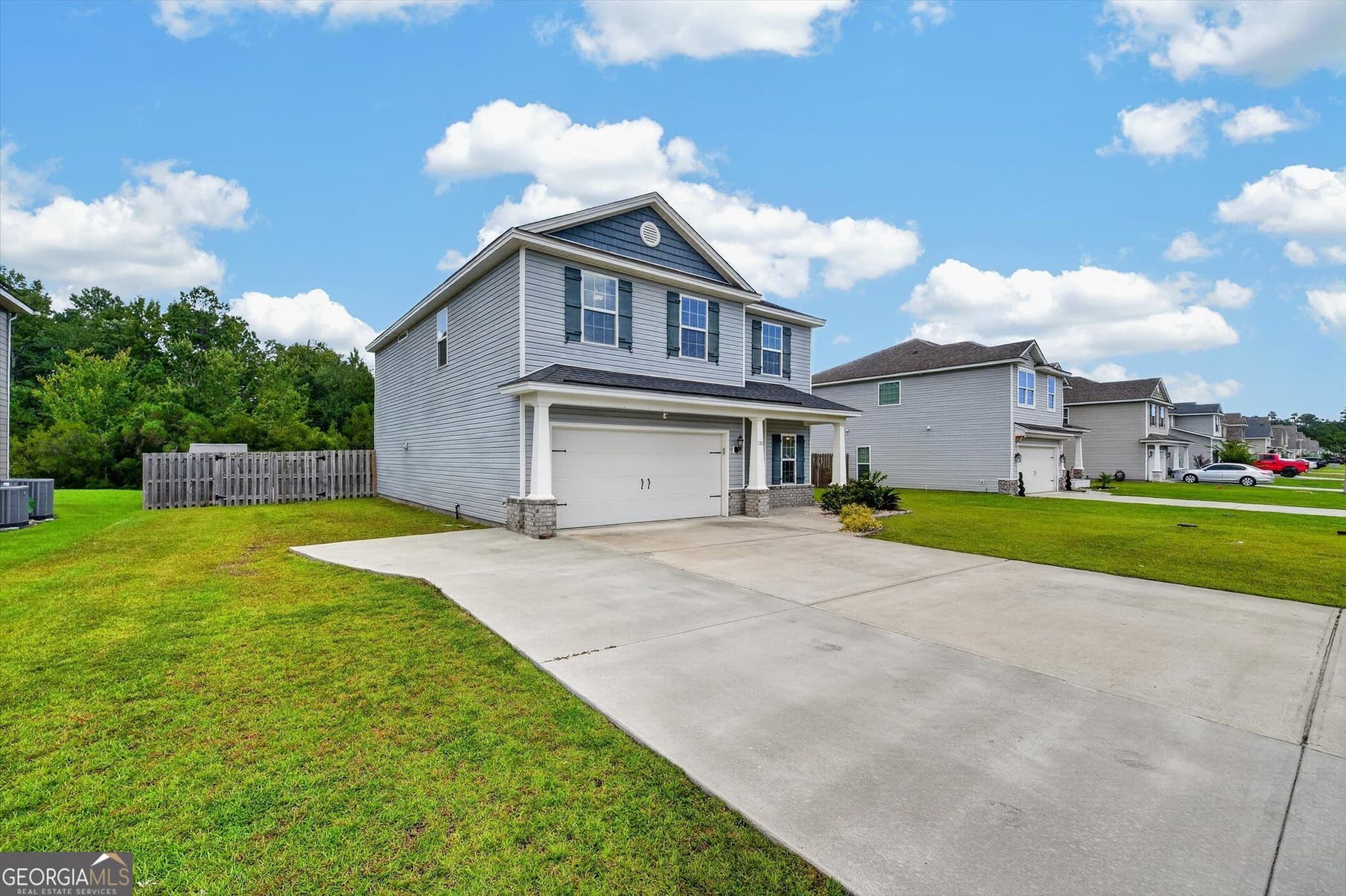 4 bedroom, 2.5 bathroom, 2,404 sq ft single family residence for sale at 130 Clover Pointe Circle, Guyton, GA 31312 — photo 2
