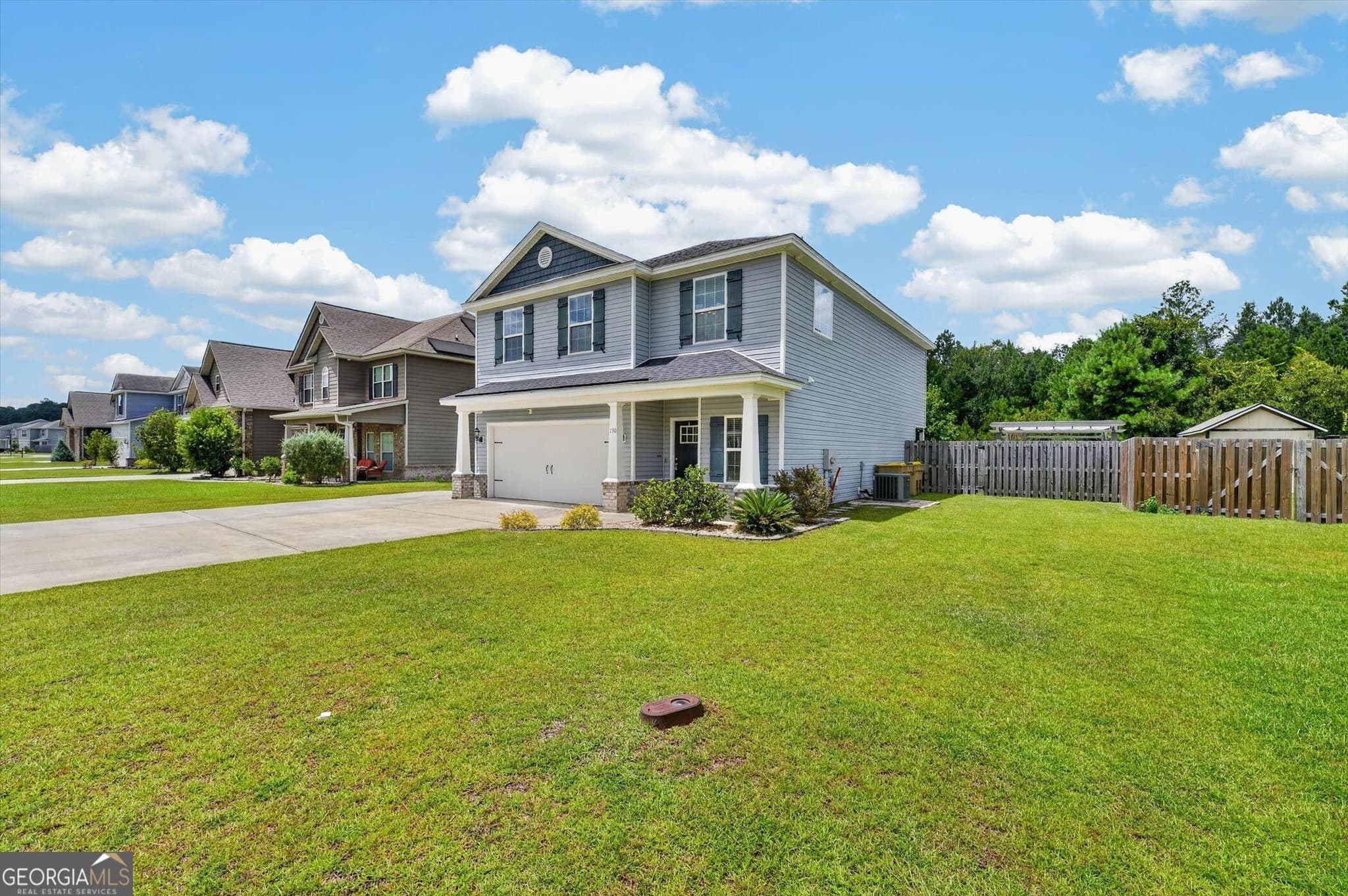 4 bedroom, 2.5 bathroom, 2,404 sq ft single family residence for sale at 130 Clover Pointe Circle, Guyton, GA 31312 — photo 4