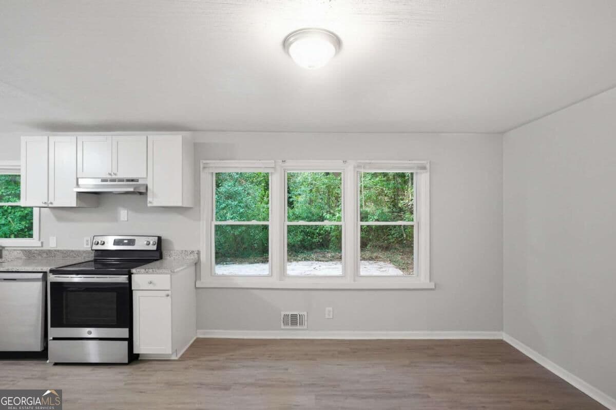 3 bedroom, 2 bathroom, 1,200 sq ft single family residence for sale at 4485 Sims Road, Ellenwood, GA 30294 — photo 6
