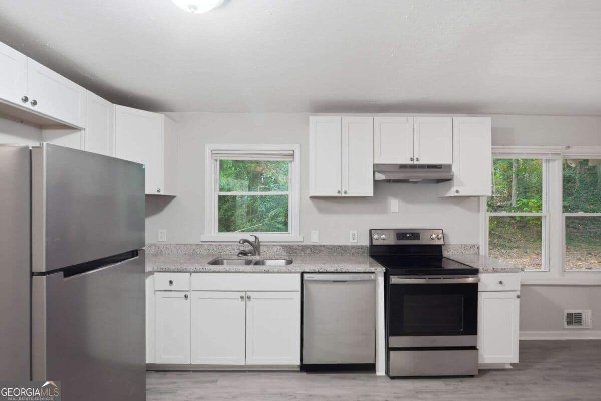 3 bedroom, 2 bathroom, 1,200 sq ft single family residence for sale at 4485 Sims Road, Ellenwood, GA 30294 — photo 7