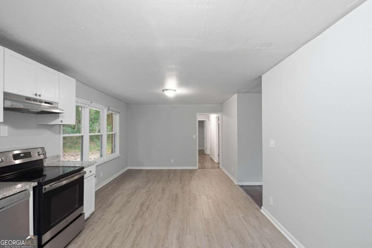 3 bedroom, 2 bathroom, 1,200 sq ft single family residence for sale at 4485 Sims Road, Ellenwood, GA 30294 — photo 5