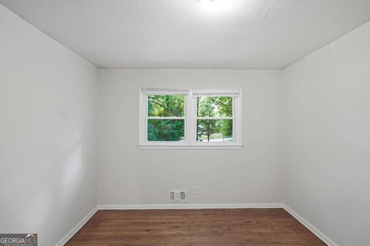 3 bedroom, 2 bathroom, 1,200 sq ft single family residence for sale at 4485 Sims Road, Ellenwood, GA 30294 — photo 9
