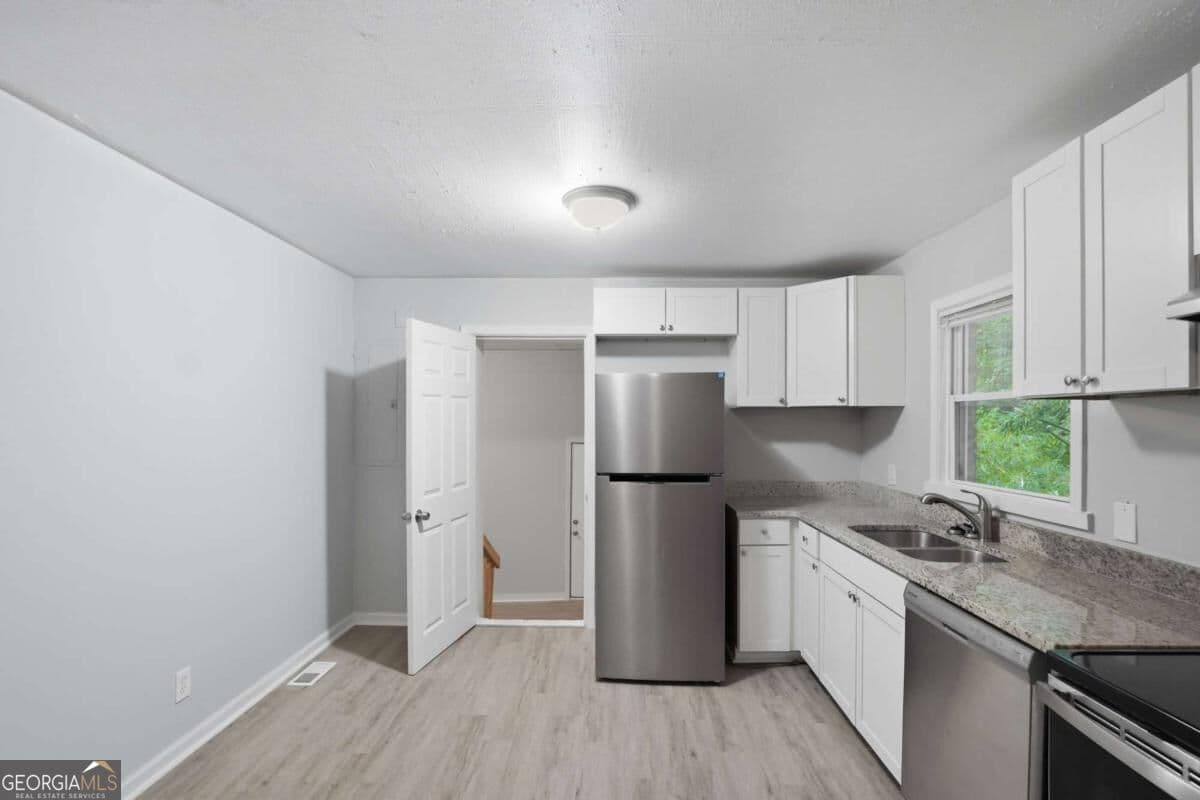 3 bedroom, 2 bathroom, 1,200 sq ft single family residence for sale at 4485 Sims Road, Ellenwood, GA 30294 — photo 8