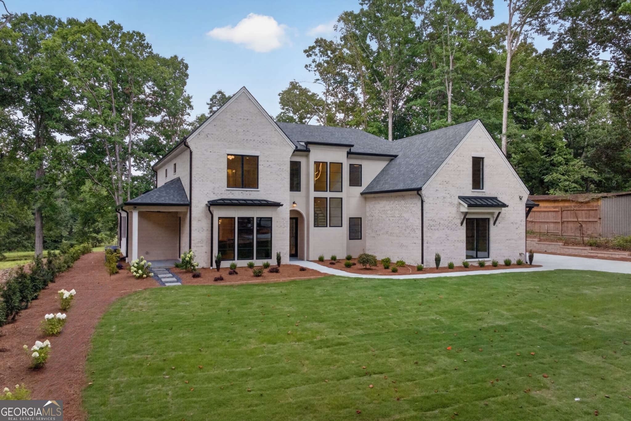 5 bedroom, 4 bathroom, 5,300 sq ft single family residence for sale at 2271 Mitchell Road, Lawrenceville, GA 30043 — photo 2