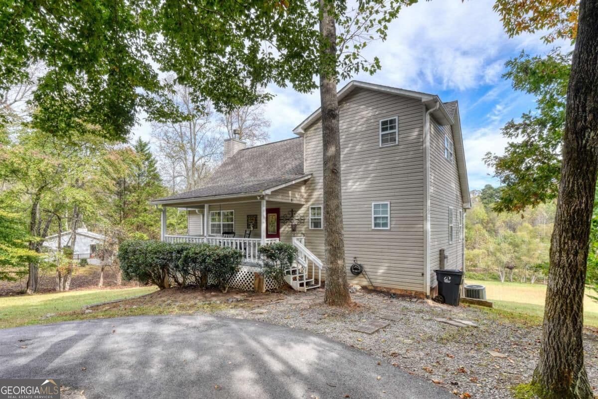4 bedroom, 3.5 bathroom, 2,280 sq ft single family residence for sale at 6744 Woodlake Circle, Young Harris, GA 30582 — photo 2