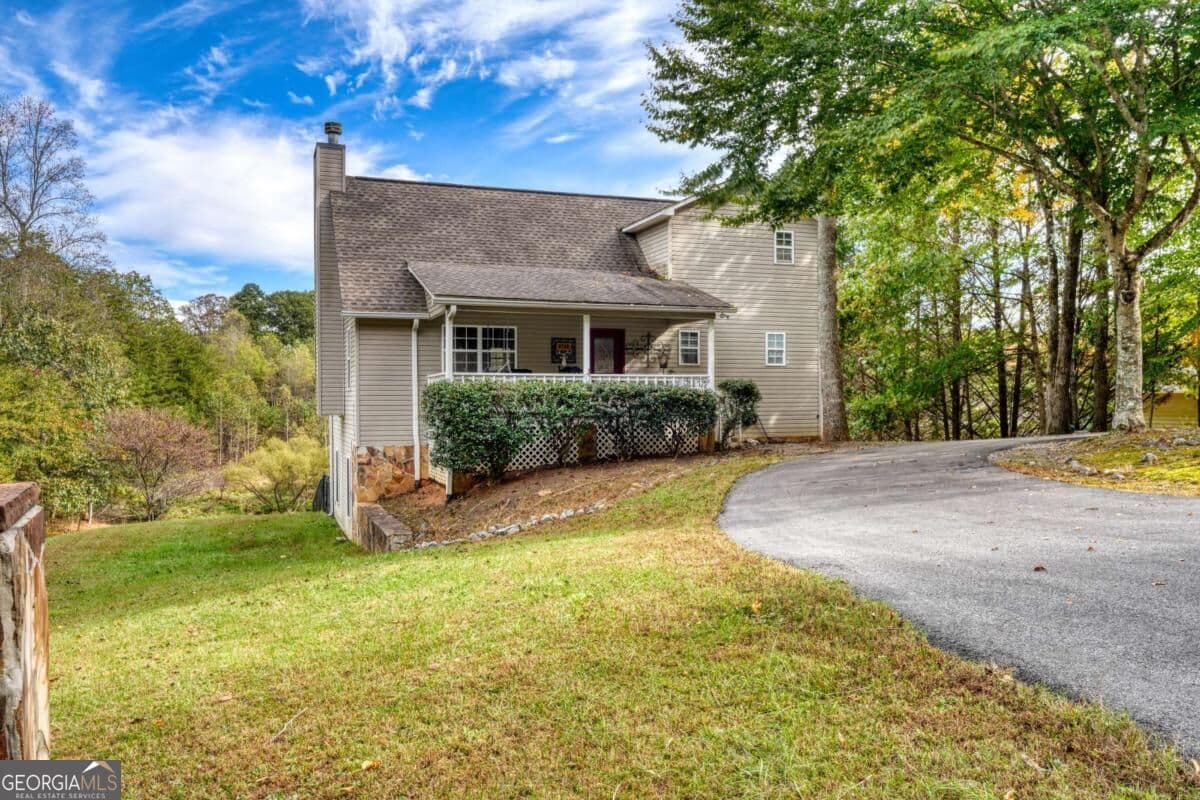 4 bedroom, 3.5 bathroom, 2,280 sq ft single family residence for sale at 6744 Woodlake Circle, Young Harris, GA 30582 — photo 6