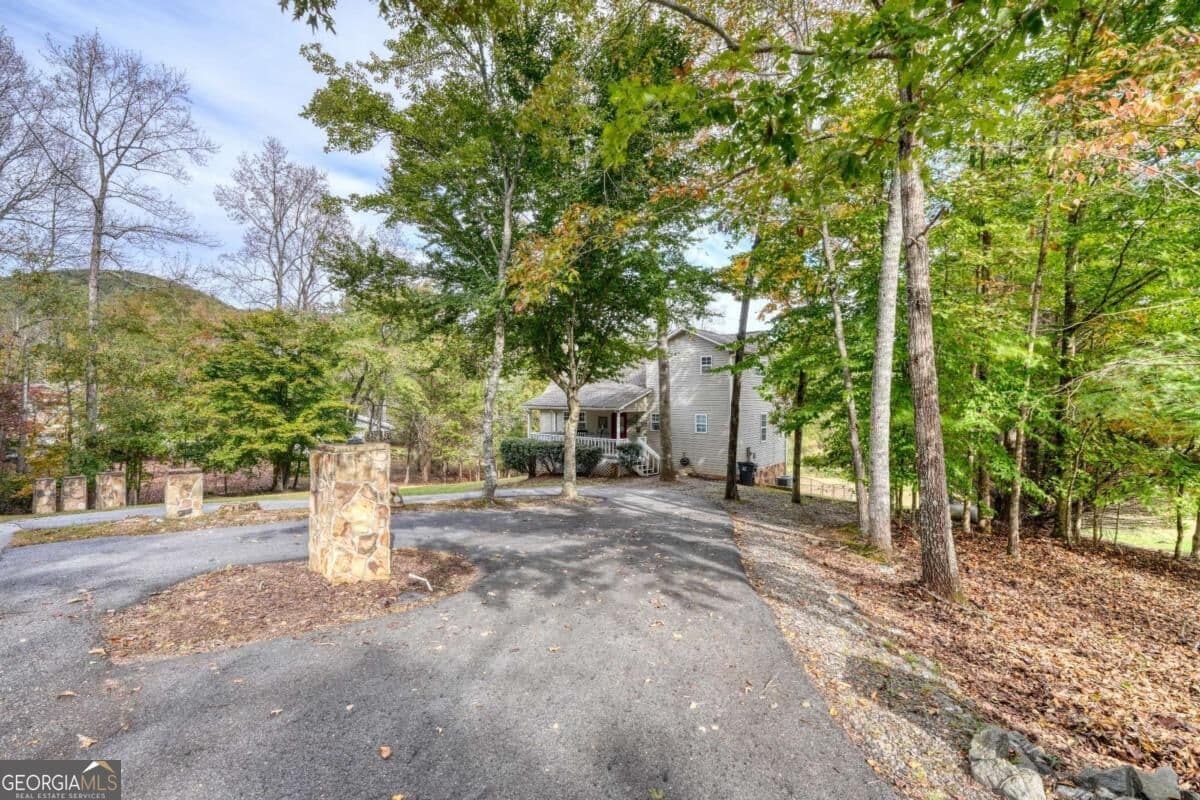 4 bedroom, 3.5 bathroom, 2,280 sq ft single family residence for sale at 6744 Woodlake Circle, Young Harris, GA 30582 — photo 7