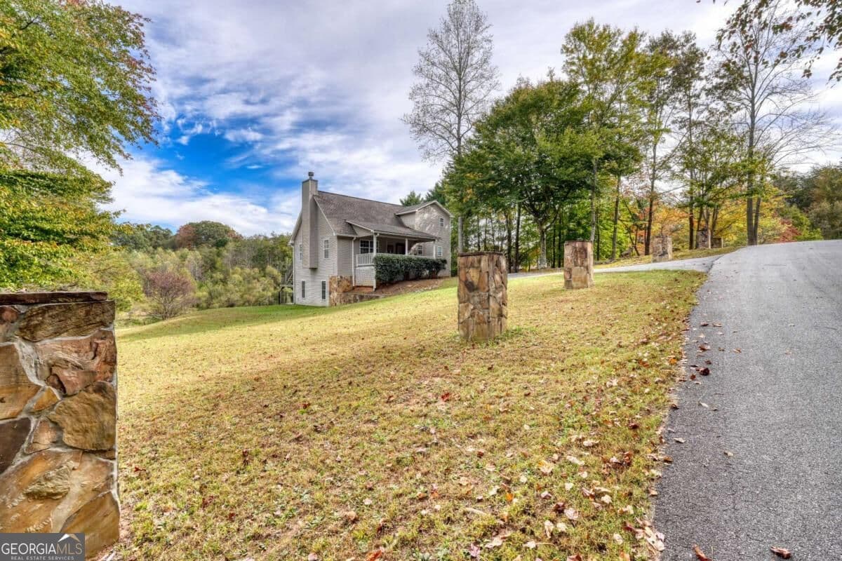 4 bedroom, 3.5 bathroom, 2,280 sq ft single family residence for sale at 6744 Woodlake Circle, Young Harris, GA 30582 — photo 5