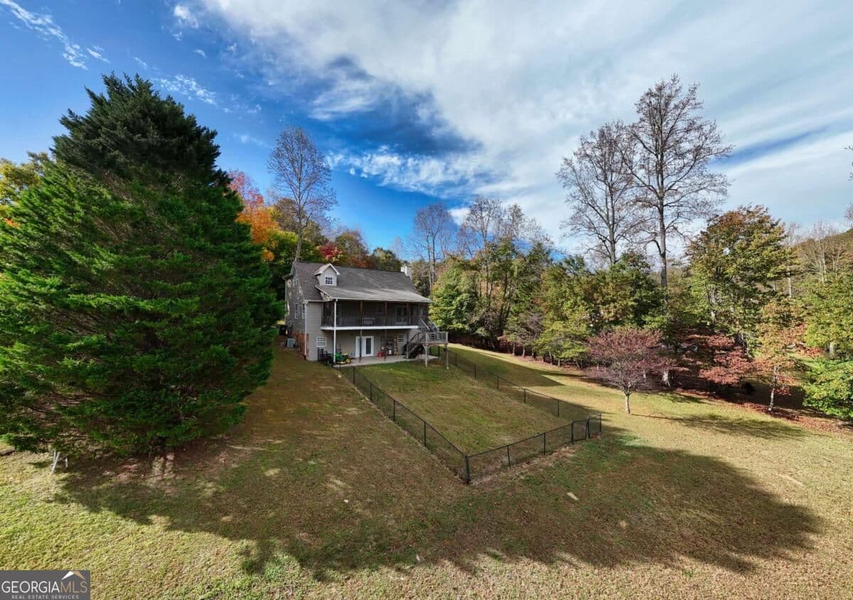 4 bedroom, 3.5 bathroom, 2,280 sq ft single family residence for sale at 6744 Woodlake Circle, Young Harris, GA 30582 — photo 4