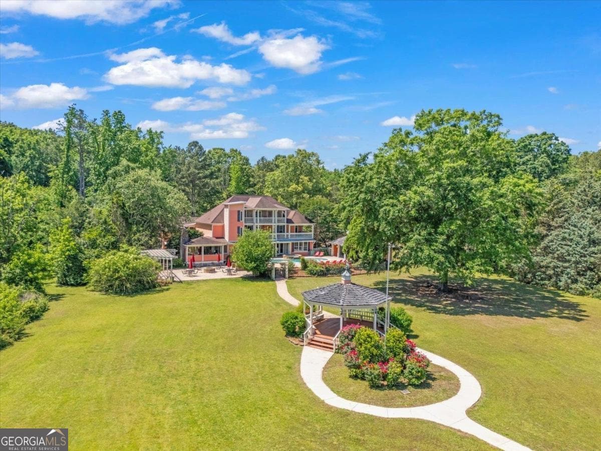 10 bedroom, 11 bathroom, 8,086 sq ft single family residence for sale at 1741 Indian Woods Drive, Greensboro, GA 30642