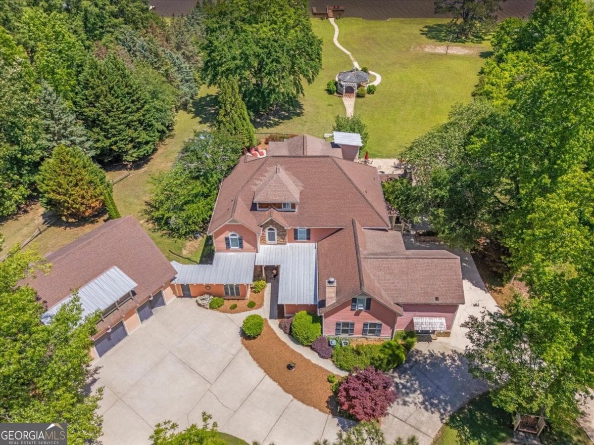 10 bedroom, 11 bathroom, 8,086 sq ft single family residence for sale at 1741 Indian Woods Drive, Greensboro, GA 30642 — photo 10
